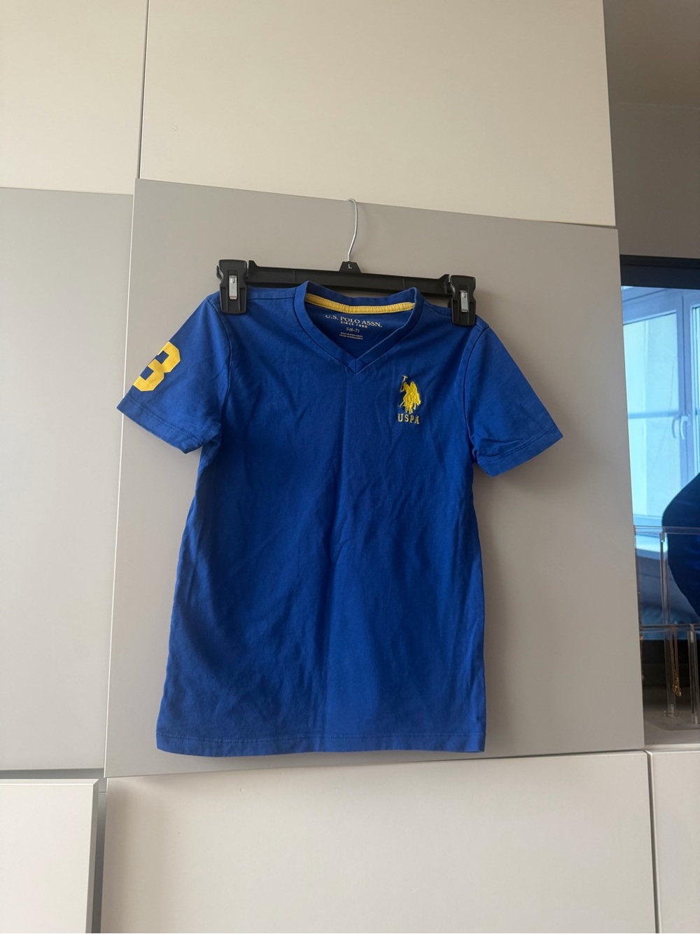 U.S. Polo Assn. Blue V‑Neck Tee with Yellow Polo Logo and Sleeve Number